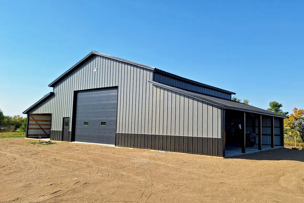 Large post-frame shop with tall sidewalls and a full-height door